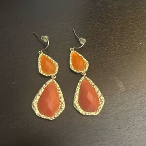 Coral and hammered gold color dangling earrings. 2.5 inches.